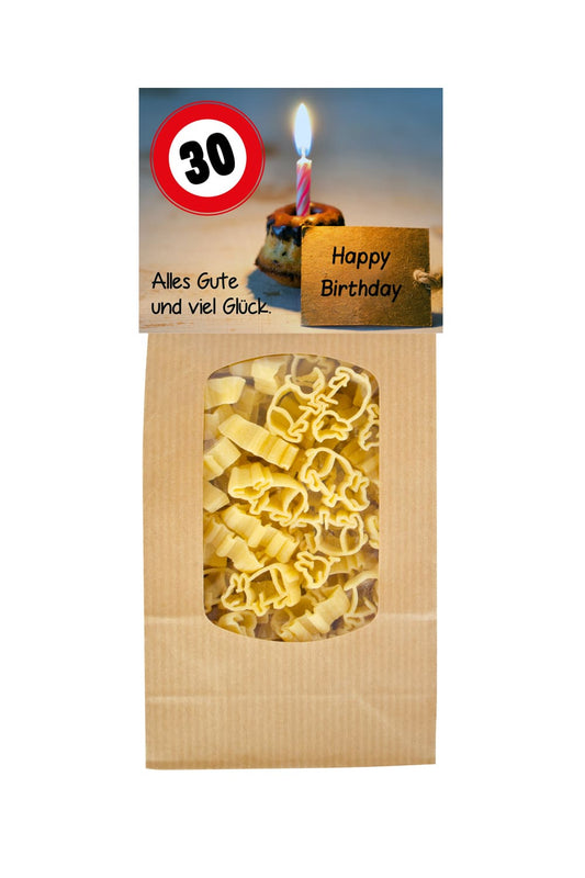 Die Pasta sind in Form von einem Gluecksschweinchen. Auf der Vorderseite steht der Spruch: 30 Happy Birthday. Alles Gute und viel Glueck. Geschenk zum 30. Geburi.