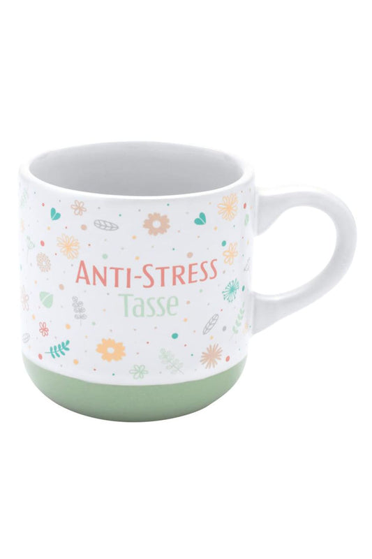 Espressotasse mit der Aufschrift: Anti-Stress Tasse. Die Keramik Spruchtasse ist mit einem Blumenmotiv bedruckt. Herziges Geschenk fuer Alle, die Espresso trinken.
