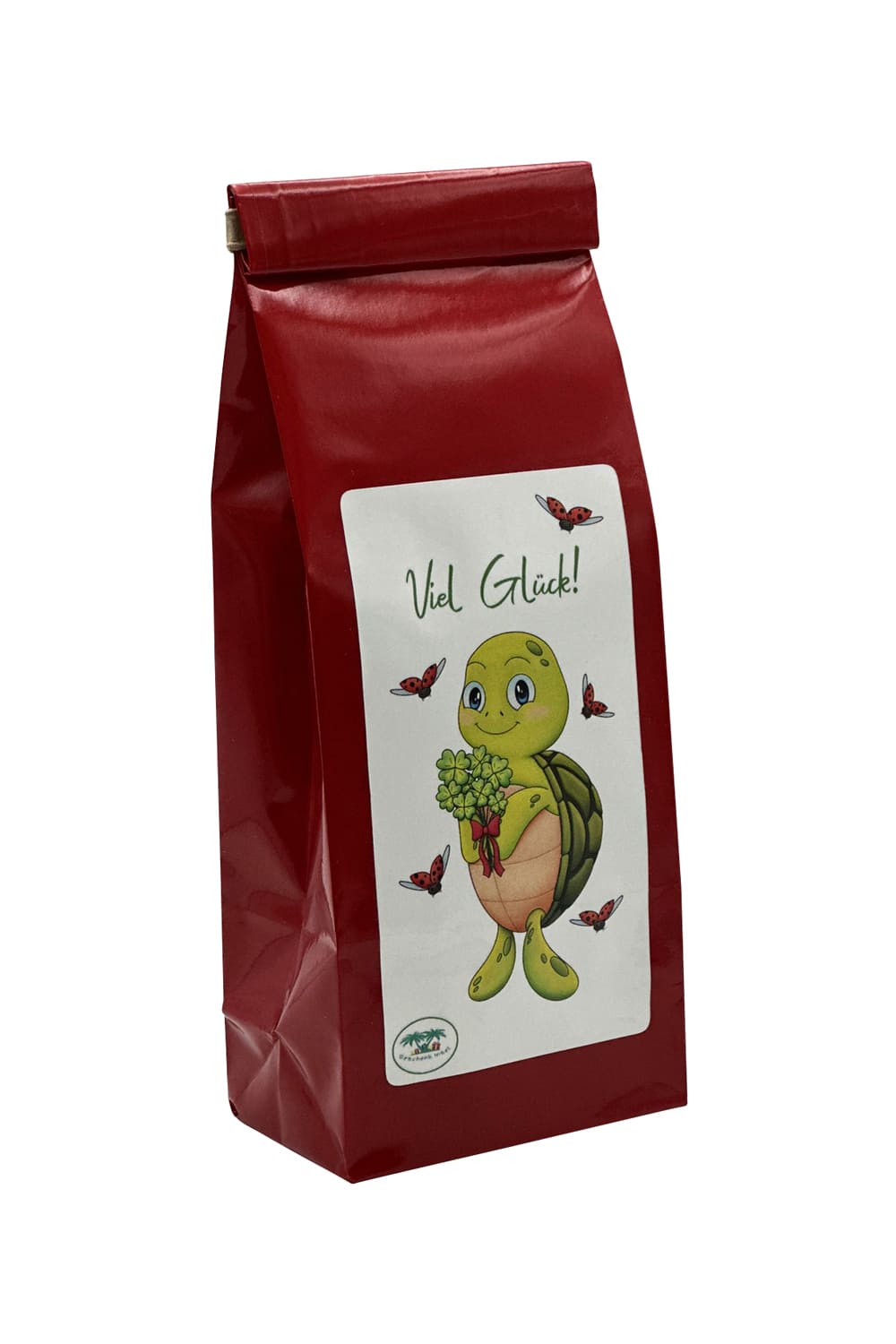 Tee mit der Aufschrift: Viel Glueck, und der niedlichen Schildkroete Lia. Die Schildkroete haelt einen Strauss voller vierblaettrigen Kleeblaettern in der Hand. Glueckstee fuer jeden Anlass!