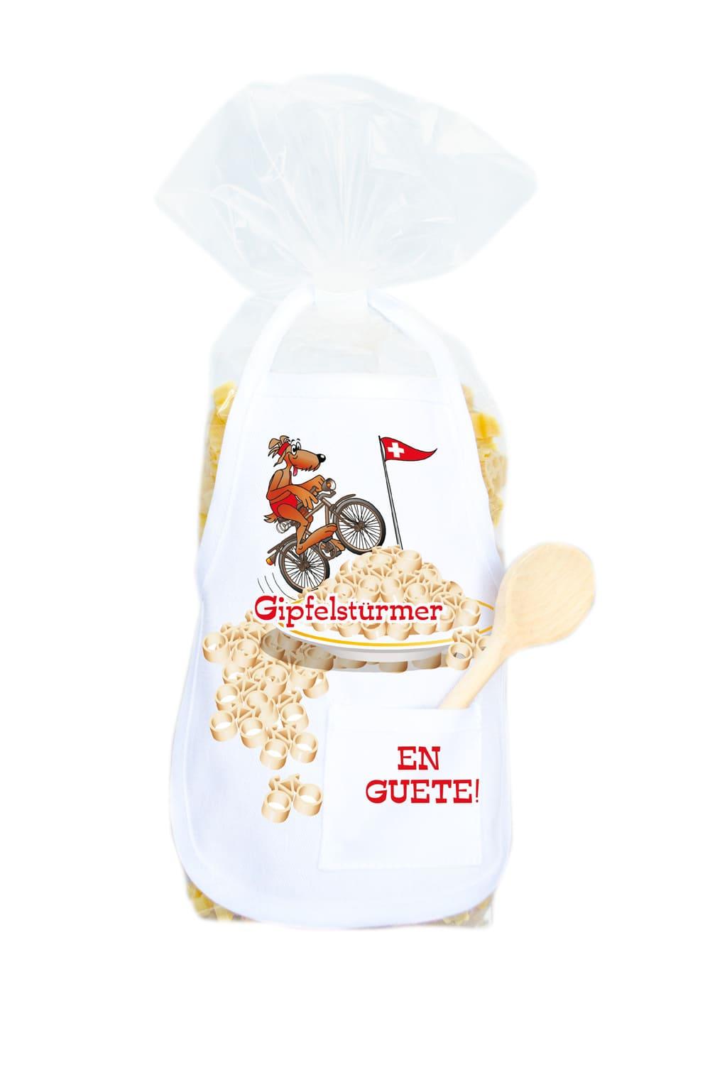 Die Pasta sind in einer Velo Form und in einer schoenen Verpackung mit Mini Kochschuerze. Auf der Schuerze steht die Aufschrift: Gipfelstuermer. Zusaetzlich befindet sich in der kleinen Tasche, ein kleiner Kochloeffel aus Holz. Originelles Nudelgeschenk!