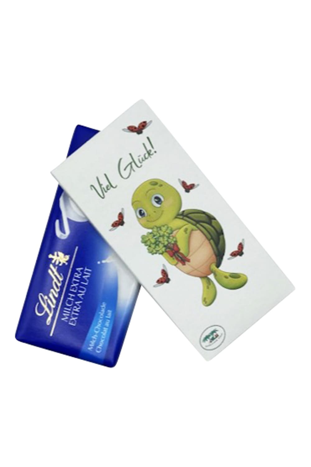 Schokolade mit der Aufschrift: Viel Glueck. Die aufgedruckte Schildkroete haelt einen Strauss voller vierblaettrigen Kleeblaettern in der Hand.