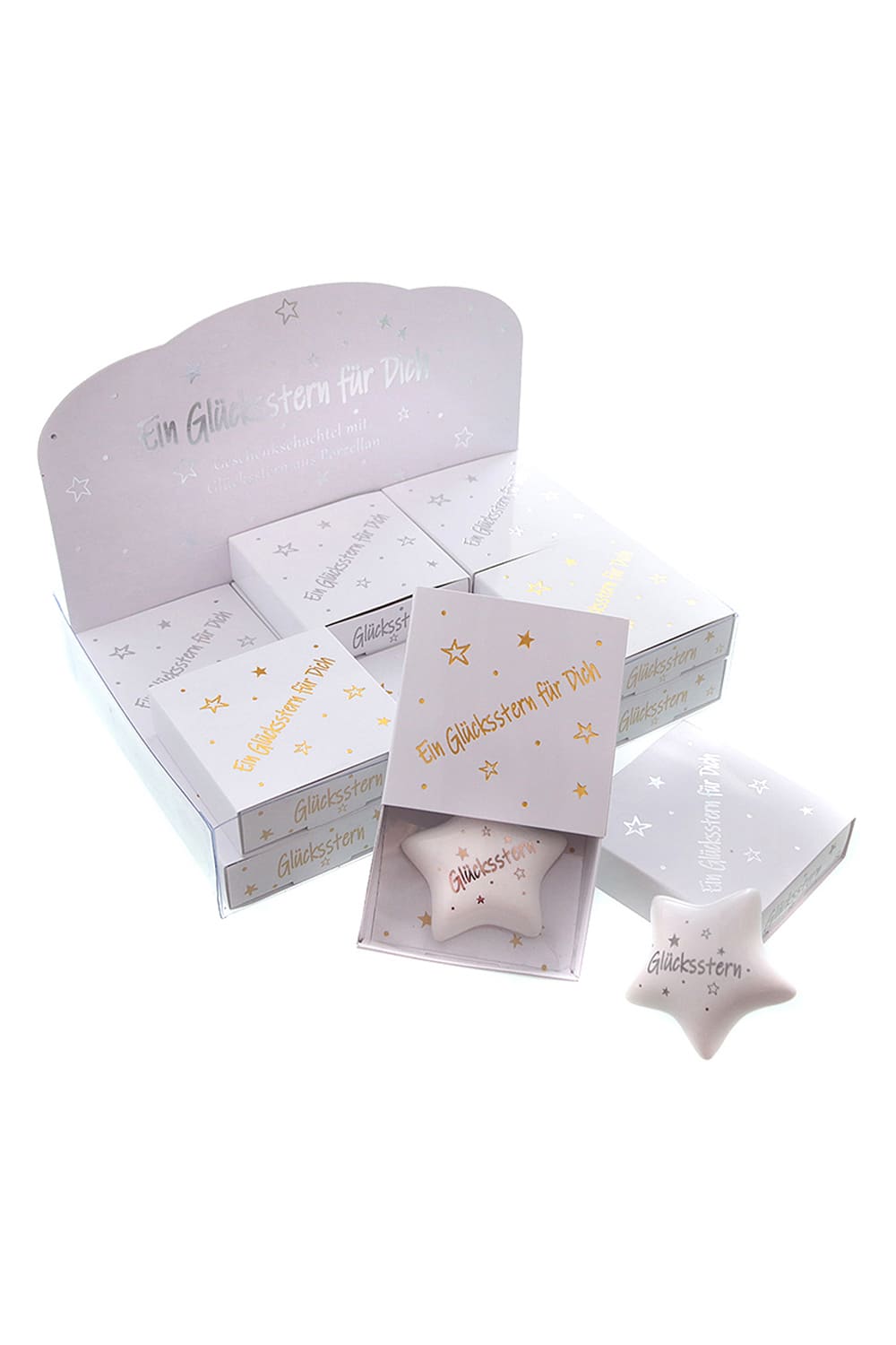 Der Gluecksstern ist verpackt im Schaechteli. Der Stern aus Keramik mit der Aufschrift: Gluecksstern. Perfektes Gluecksbringer Geschenk!