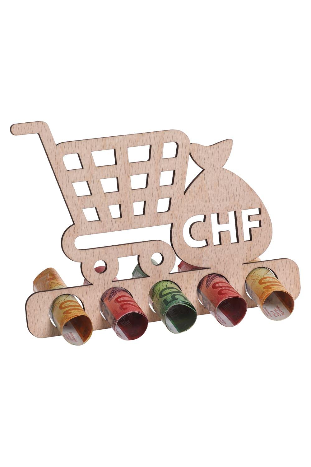Der CHF Shopping Holzaufsteller ist eine perfekte Geschenkidee fuer ein Geldgeschenk oder Gutscheingeschenk. Einfach die Geldnoten rollen und durch die Loecher stecken. Ein originelles Geschenk aus Holz. Der Holzaufsteller hat 5 Loecher, in die man Geld oder gerollte Gutscheine stecken kann.