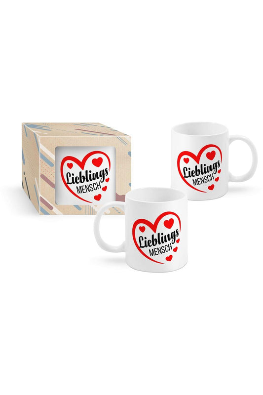 Die Spruchtasse mit der Aufschrift: Lieblingsmensch, ist perfekt als Geschenk fuer alle Menschen, die man liebt und schaetzt. Die Keramiktasse ist beidseitig bedruckt. Die Tasse mit Herz kann beliebig mit anderen Geschenken kombiniert werden. Verpackt in einer schönen Kartonbox.