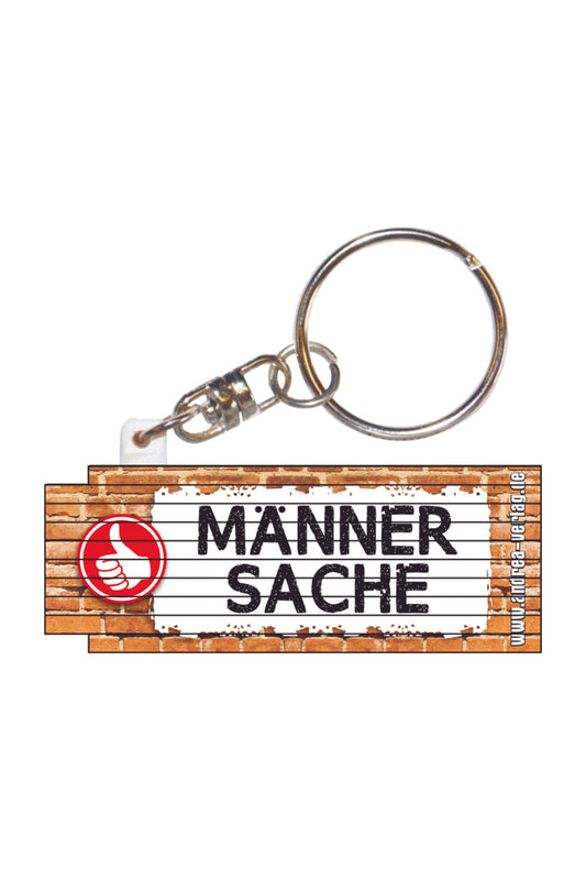 Kleiner Zollstock mit der Aufschrift: Maennersache! Der Mini-Meter ist zugleich ein praktischer Schluesselanhaenger. Der kleine Zollstock ist ausklappbar bis zu 50 cm.