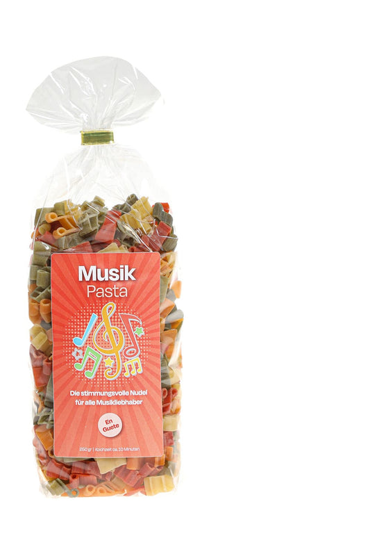 Pastasaeckli mit der Spruchetikette: Musik Pasta. Die stimmungsvolle Nudel fuer alle Musikliebhaber. En Guete. Die Motiv Teigwaren sind in Notenschluessel Form!