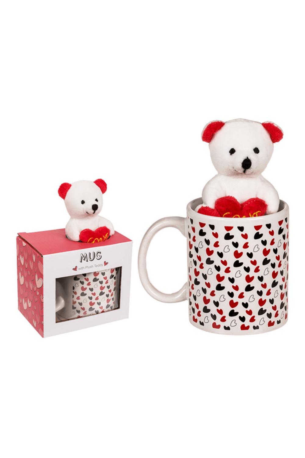 Die Tasse ist bedruckt mit Herzchen. Zusaetzlich sitzt in der Herzlitasse ein Plueschbaer. Der Baer selbst, haelt in der Hand ein Herz mit der Aufschrift: Love. Die herzige Tasse ist verpackt in einem Geschenkkarton. Ein perfektes Geschenk zum Valentinstag, fuer Verliebte oder als kleines Hochzeitsgeschenk.