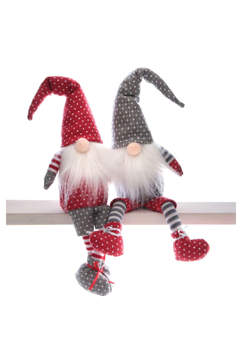 Dieser suesse Textilwichtel ist einfach ein perfektes Geschenk zu Weihnachten. Der Kantensitzer Wichtel ist ca. 50 cm lang und ist niedlich gekleidet im Puenktchen-Style. Ein kreatives Wichtelgeschenk fuer die Adventszeit!!! Die Wichtel sind in 2 Motive (Farben) sortiert. kann nicht ausgewaehlt werden!!