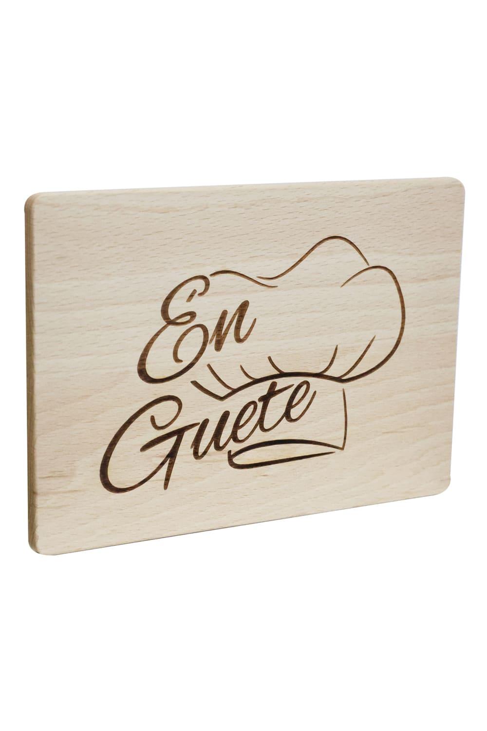 Mit diesem Schneidebrett aus Holz haben Sie ein originelles und praktisches Geschenk. Das Fruehstuecksbrett ist mit der Laserbeschriftung: En Guete.