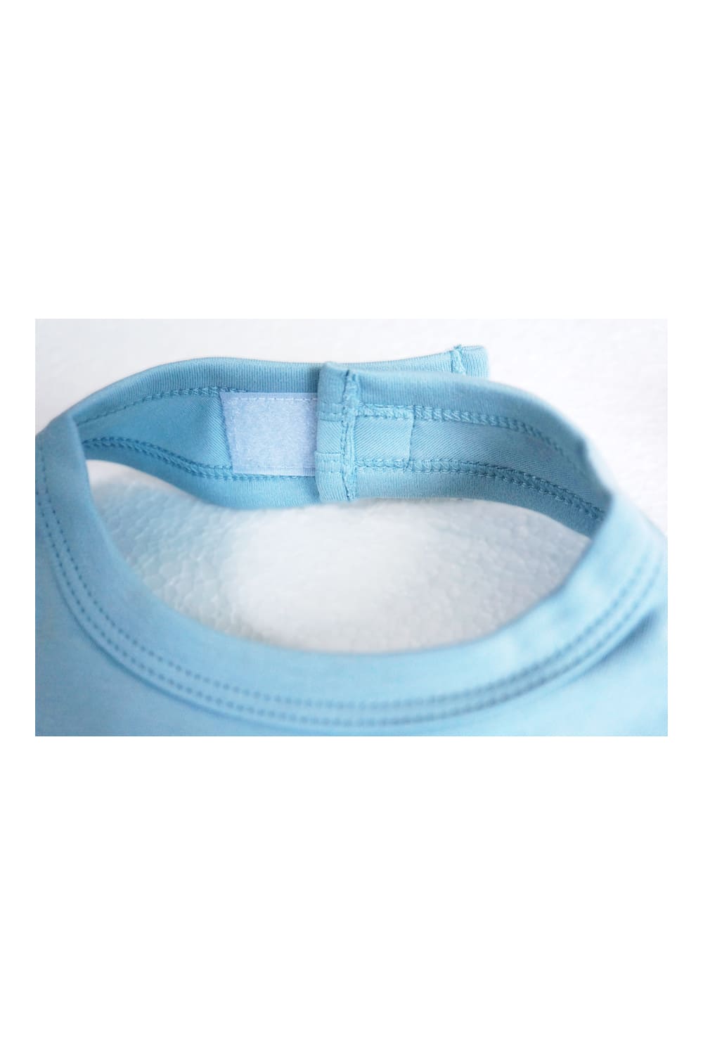 Babylatz mit Klettverschluss und aus reiner Baumwolle