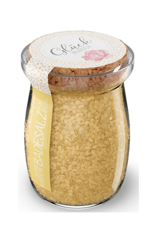 Badesalz im Glas mit Korkdeckel und dem Spruch: Glueckwunsch