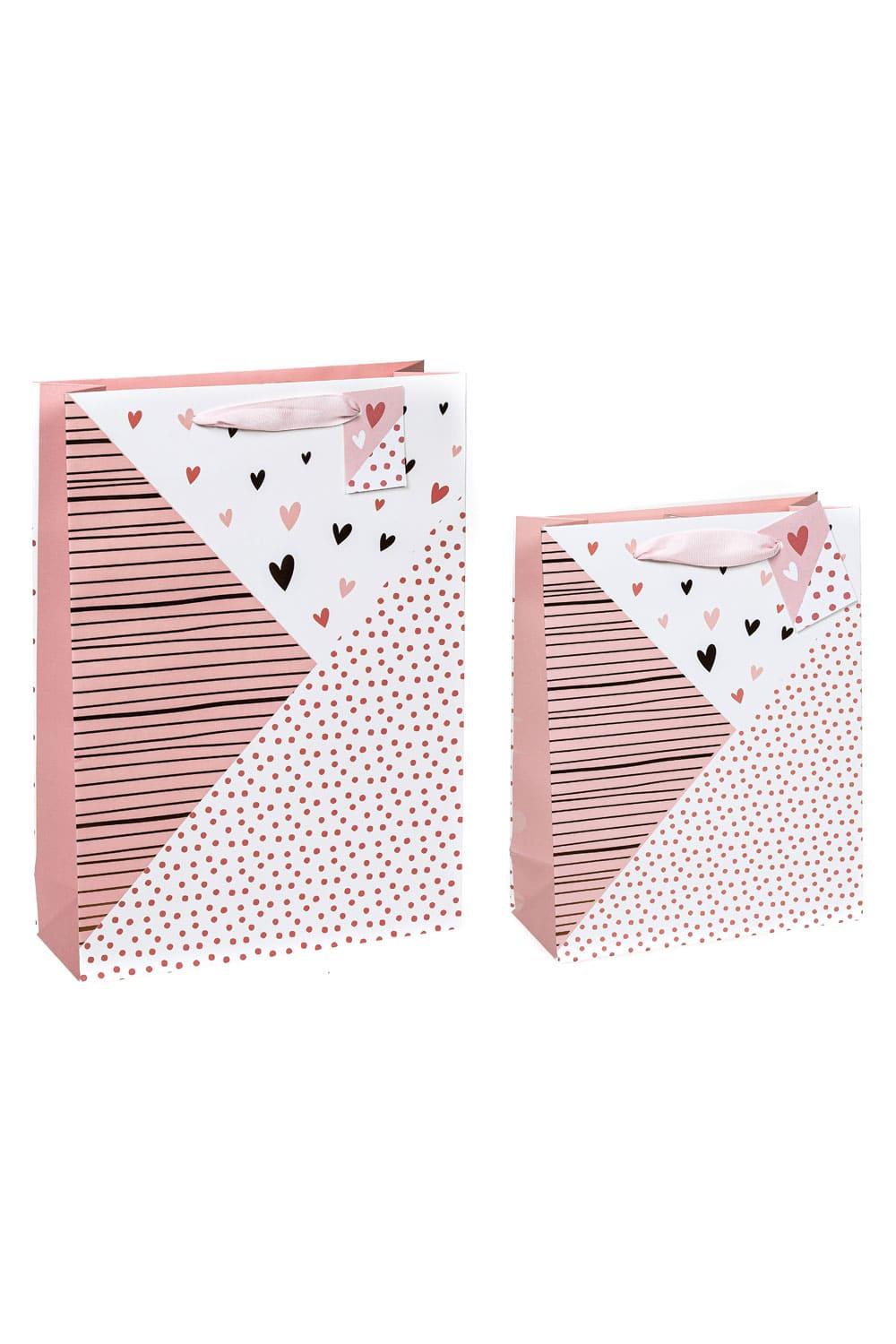 Hochwertige Herz Geschenktasche mit Glanzdruck. Eine herzige Geschenktuete zum Valentinstag, zur Hochzeit, zum Geburtstag oder zu einem sonstigen Anlass! Die Geschenktasche gibt es in zwei unterschiedlichen Groessen (auswaehlbar). Einfach eine originelle und suesse Geschenkverpackung!