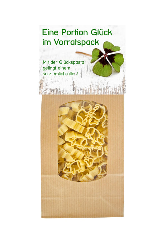 Die Pasta sind in Schweinchen Form. Mit Spruch: Eine Portion Glueck im Vorratspack. Mit der Glueckspasta gelingt einem so ziemlich alles. Ideales Teigwaren Geschenk!