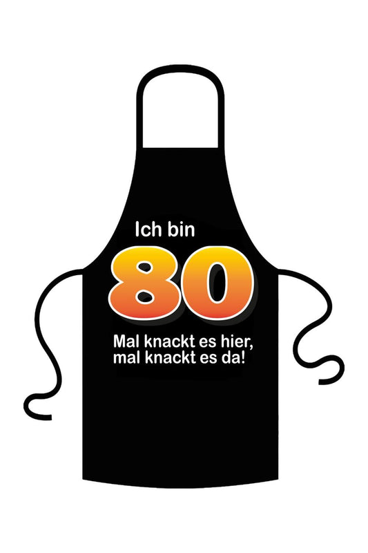 Eine trendige Schuerze zum 80. Geburtstag mit witzigem Spruch. Es stehen fuenf verschiedene Sprueche zur Auswahl. Textilfarbe rot . Schuerze schwarz: Ich bin 80. Mal knackt es hier.