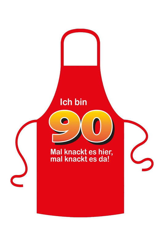 Eine trendige Schuerze in rot zum 80. Geburtstag mit witzigem Spruch. Es stehen fuenf verschiedene Sprueche zur Auswahl. Textilfarbe rot . Schuerze: Ich bin 90. Mal knackt es hier.