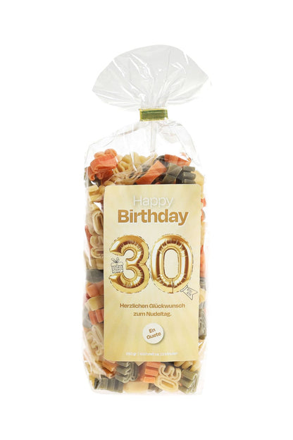 30. Geburtstag Pastasaeckli mit Spruchetikette: Happy Birthday. 30. Bestes Alter! Herzlichen Glueckwunsch zum Nudeltag. En Guete. Pasta in der Form der Zahl 30.
