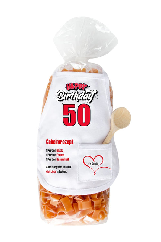 Pasta zum 50. Geburtstag in Herzchenform! Kreative Verpackung mit kleiner Schuerze. Die Mini-Kochschuerze ist bedruckt mit der Aufschrift: Happy Birthday 50 und einem Geheimrezept. Diese Herz Teigwaren sind ein absolut leckeres Geschenk.