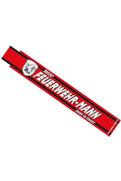 Lustiger Feuerwehr Meter mit der Aufschrift: Bester Feuerwehr-Mann. Immer im Einsatz! Der lustige und einzigartige Meter ist das perfekte Geschenk fuer Feuerwehrmaenner! Der lustige Doppelmeter ist einfach einzigartig. Der Zollstock ist biegsam und bis zu 2 Meter ausziehbar, mit Feder-Klick-Gliedern und farbfest. 