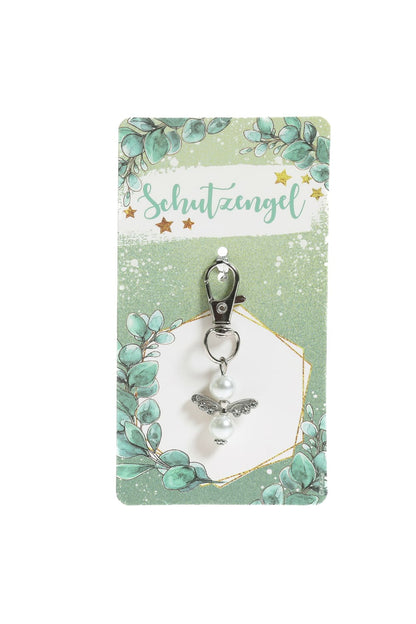 Dieser suesse Perlenengel Schutzengel mit Anhaenger ist ein tolles Geschenk fuer jeden Anlass. Der Engel mit dem Spruch: Schutzengel.