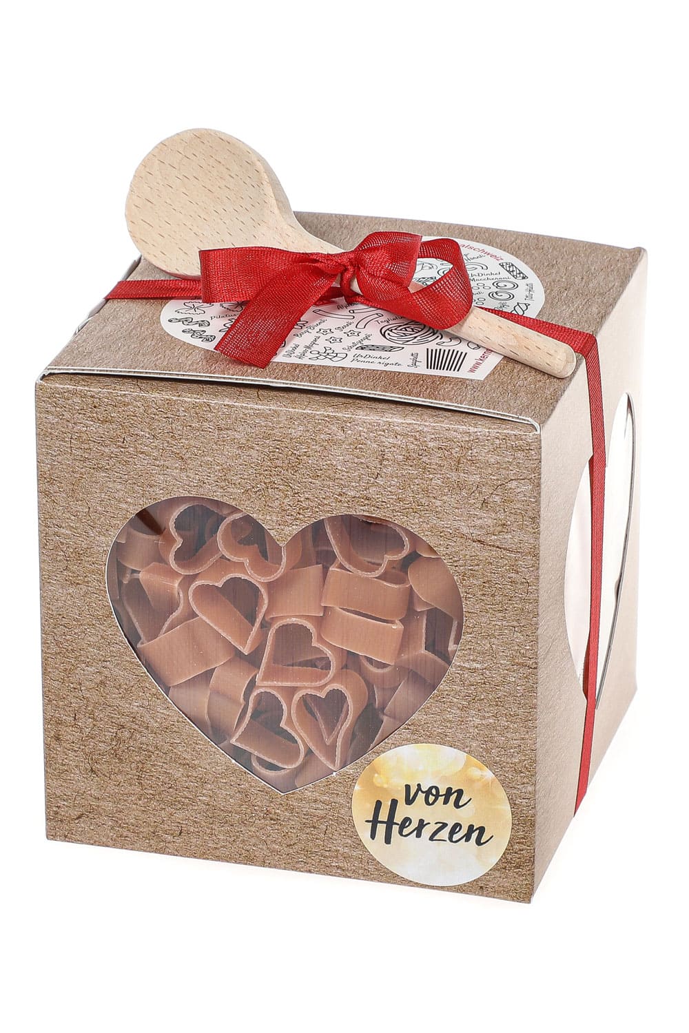 Pasta Geschenkbox als Geschenk Nudeln. Mit roter Schlaufe und Holz Kochloeffel. Herz Teigwaren in schoener Verpackung. Von Herzen