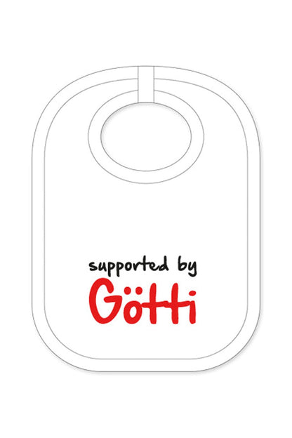Babylatz mit der Aufschrift: Supported by Götti als Geburtsgeschenk