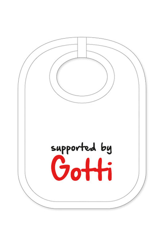 Babylatz mit der Aufschrift: Supported by Gotti als Geburtsgeschenk