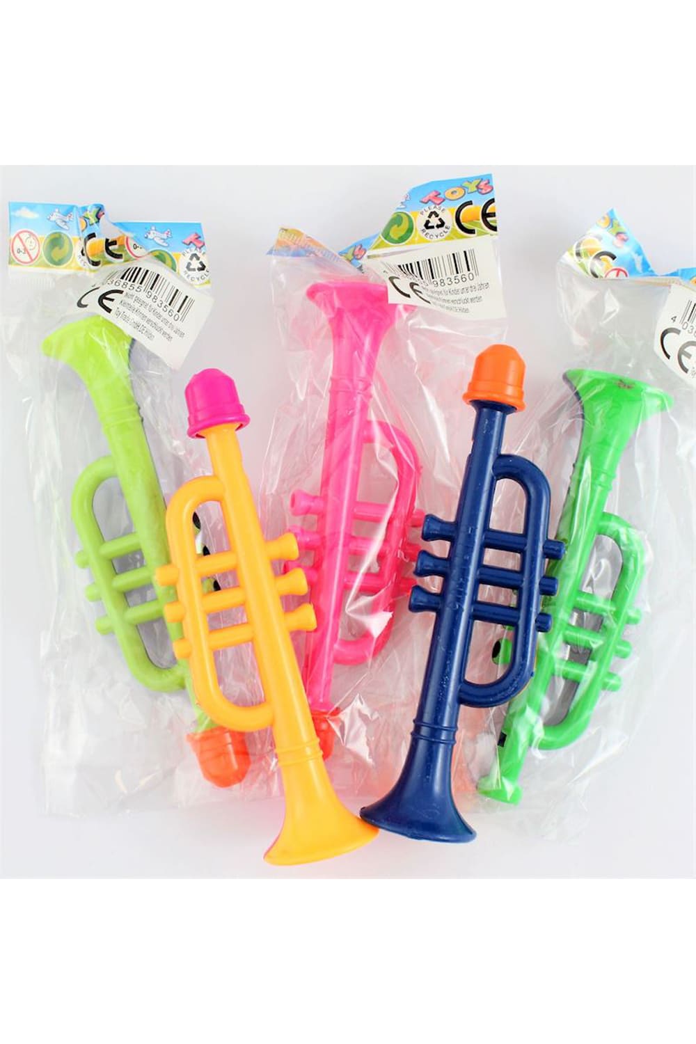 Trompete fuer Kinder ca. 13 cm gross. Musikinstrument in den farebn blau, gelb, grün, rosa.